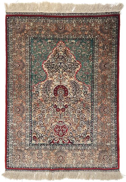 null Fine Sino Hereke silk carpet embroidered with golden threads, circa 1980 
Dimensions...