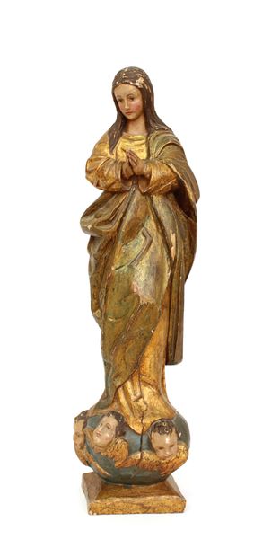 null Vierge en majesté en bois sculpté polychrome et doré
Travail méridionnal en...