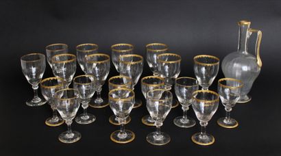 null Part of a glassware service in crystal with gold decoration of combs including...