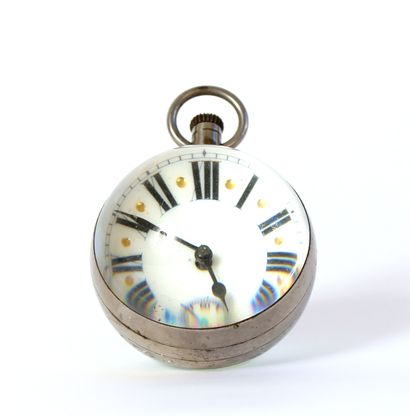 null Officer's clock, ball-shaped, in burr glass and metal, the dial with Roman numerals...