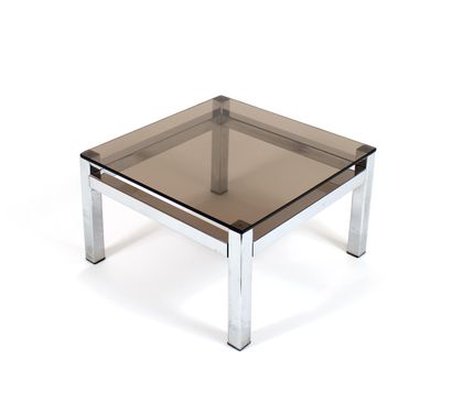 null MODERN WORK, 70's
Coffee table that can form the end of a sofa in chromed metal...