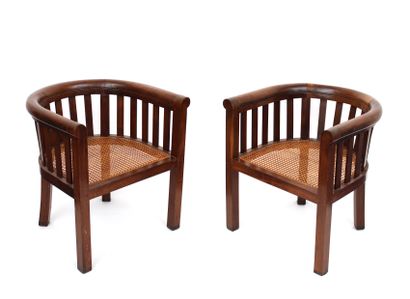 null INDOCHINA, pair of mahogany wrap-around armchairs with cane seat, circa 1930/1940
W....