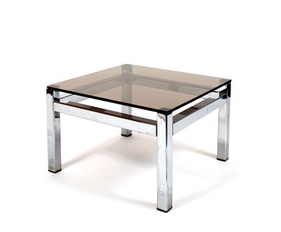null MODERN WORK, 70's
Coffee table that can form the end of a sofa in chromed metal...