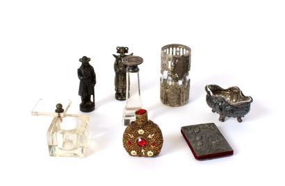 null OBJECTS OF WINDOW
Set including a glass bottle with openwork decoration in filigree...