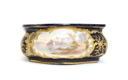 null SÈVRES, Louis-Philippe period
Ceramic planter decorated with views of castles...