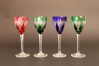 null SAINT-LOUIS 
Suite of four wine glasses out of blown and cut crystal of color
Stamp...