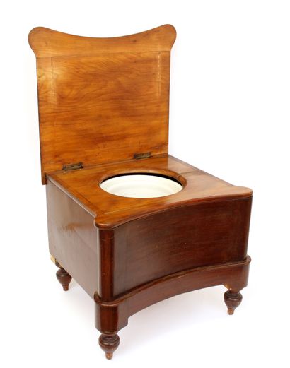null English convenience in turned and molded mahogany with double flaps, the first...