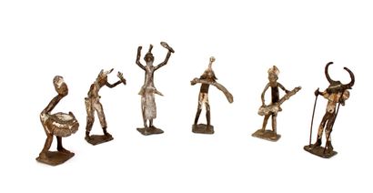 null AFRICA
Suite of eight iron figurines representing musicians and dancers for...