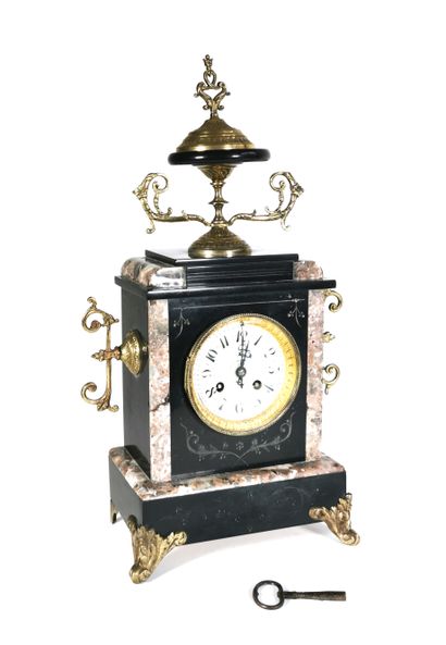 null Marble clock with engraved decoration of foliage, ornaments of chased and gilded...
