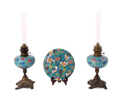 null LONGWY
Pair of oil lamps, the enamelled earthenware tanks decorated with flowering...