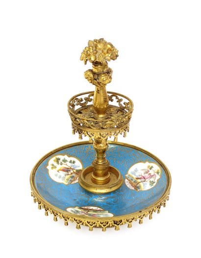 null Porcelain display stand decorated with birds in cartouches, chased and gilded...