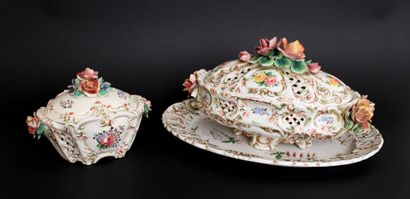 null Italian earthenware pieces with a rose patterned slip, including a tureen and...