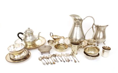 null Set of silver plated metal pieces including five kettles, a goblet, a bowl and...