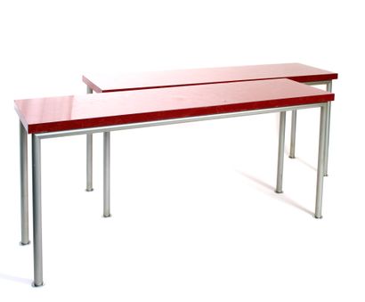 null MODERN WORK, circa 2000
Pair of console tables with a tubular base in grey lacquered...