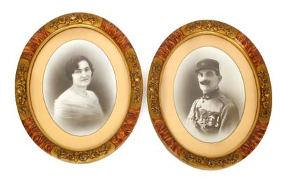 null Pair of photographic portraits of a couple, the man in military uniform of the...