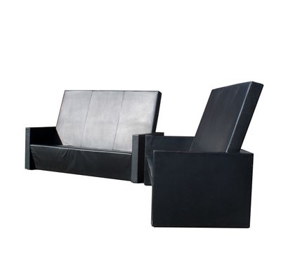 null MATTEO GRASSI
Pair of black leather sofa with high sloping back, model LMNTR-NVL08...