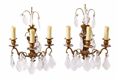null Pair of three-light gilt bronze and brass sconces
Mounted with electricity
H....