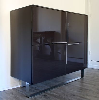 null MODERN WORK, circa 2000
Lacquered sideboard with four doors, the front base...