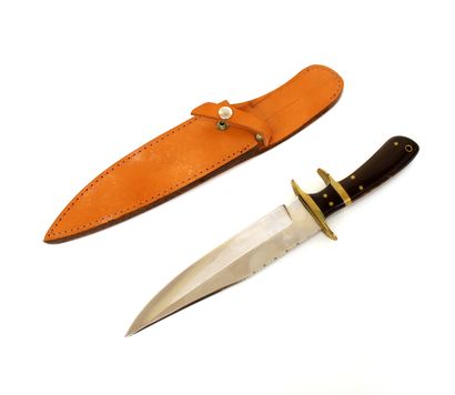 null Séguin, hunting knife, the handle in steel, brass and polished wood
L. 31 cm
With...