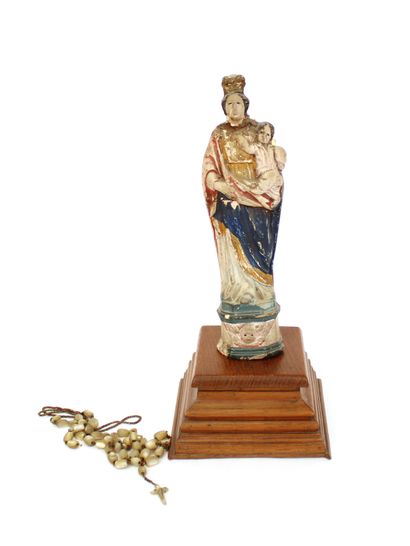 null Virgin and Child in polychrome plaster mounted on a natural wood base with mother-of-pearl...