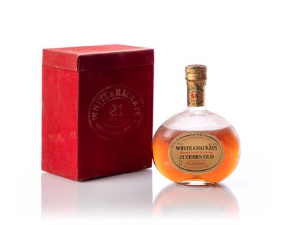 null 1 bouteille (75 cl. – 43°) SCOTCH WHISKY WHYTE MACKAYS 21 ans
Année : NM
Appellation...
