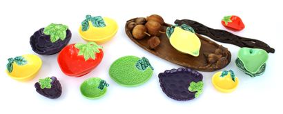 null Set of twelve ceramic fruit-shaped bowls and cups, including a carved wooden...