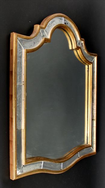 null Moulded and gilded wood mirror with glazing bead
H. 72 x W. 55.8 cm