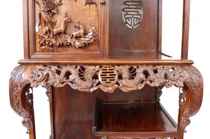 null INDOCHINA late 19th - early 20th century
Display cabinet in exotic wood, richly...