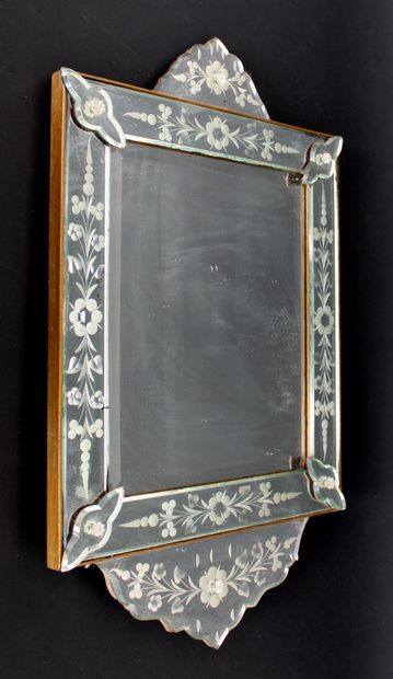 null Venetian mirror in eglomised glass with floral decoration, wooden frame, bevelled...