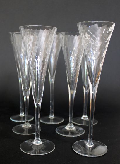 null Suite of five geometric-shaped crystal Champagne flutes
H. 17 cm
Twenty-three...