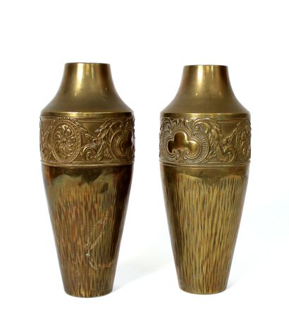 Pair of copper vases with repoussé decoration...