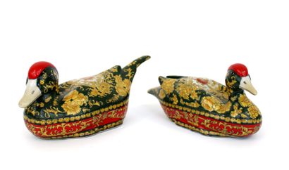 null CHINA, enameled porcelain ducks with rich floral decoration and leafy arabesques
L....