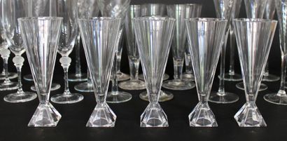 null Suite of five geometric-shaped crystal Champagne flutes
H. 17 cm
Twenty-three...