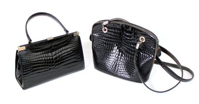 null Two imitation crocodile handbags with handles and shoulder strap
H. 21 x W....