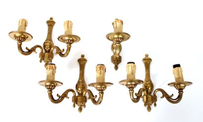 null Suite of four one- and two-light ormolu sconces in the 18th-century style, decorated...