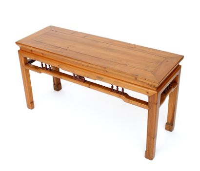 null CHINA, low console table in natural wood, the openwork belt decorated on all...