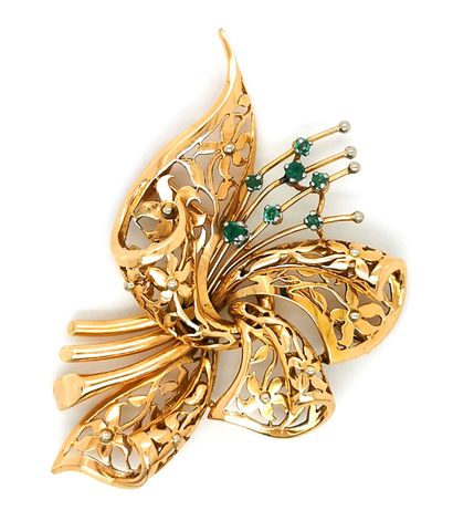 null 18K (750 thousandths) yellow gold and platinum spray brooch styling a ribbon...