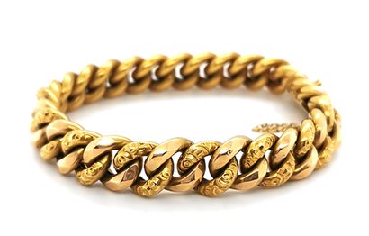 null Flexible, articulated bracelet in 18K (750 thousandths) yellow gold with curb...