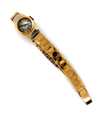 null JUPITER
Ladies' wristwatch in 18K (750 thousandths) yellow gold, flexible, articulated...
