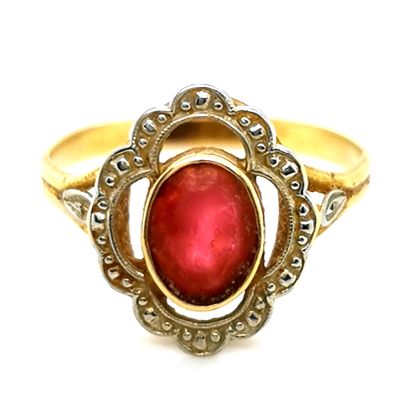 null 18K (750 thousandths) two-tone gold ring set with a ruby imitation stone with...