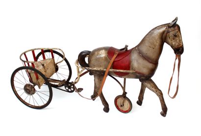 null Pedal horse sulky 50's
Painted sheet metal, welded iron and leather straps
L....