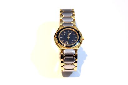 Yves Saint-Laurent LADY'S WATCH in steel and gilt metal, blue enamelled dial.

Minor...
