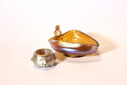 Louis Comfort TIFFANY (1848-1933) Sauce boat and salt cellar in iridescent glass....