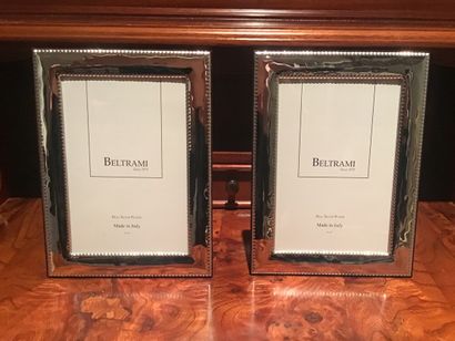 null 
Pair of Beltrami silver plated frames. 

Hallmarked at the bottom and wood...