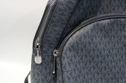 null MICHAEL KORS 
Leather and canvas backpack monogrammed with the brand's logo...