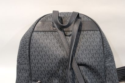 null MICHAEL KORS 
Leather and canvas backpack monogrammed with the brand's logo...