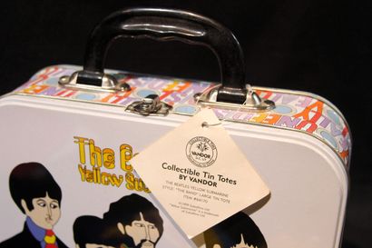 null BEATLES
Reunion of three authentic promotional items, including a metal briefcase...