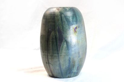 null Truss ROEST-CHAPMAN (Active) 
Green ceramic vase with iridescent sheen, signature...