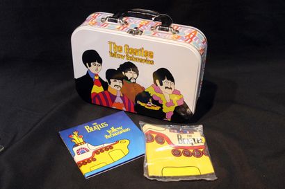null BEATLES
Reunion of three authentic promotional items, including a metal briefcase...