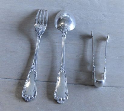 null Lot including a silver child's cutlery (Weight: 97g) and a silver sugar tongs...